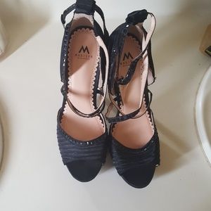 Black platform heels that go around the ankle